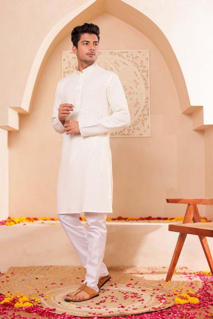 Ivory Chikankari Embroidered Kurta Suit.