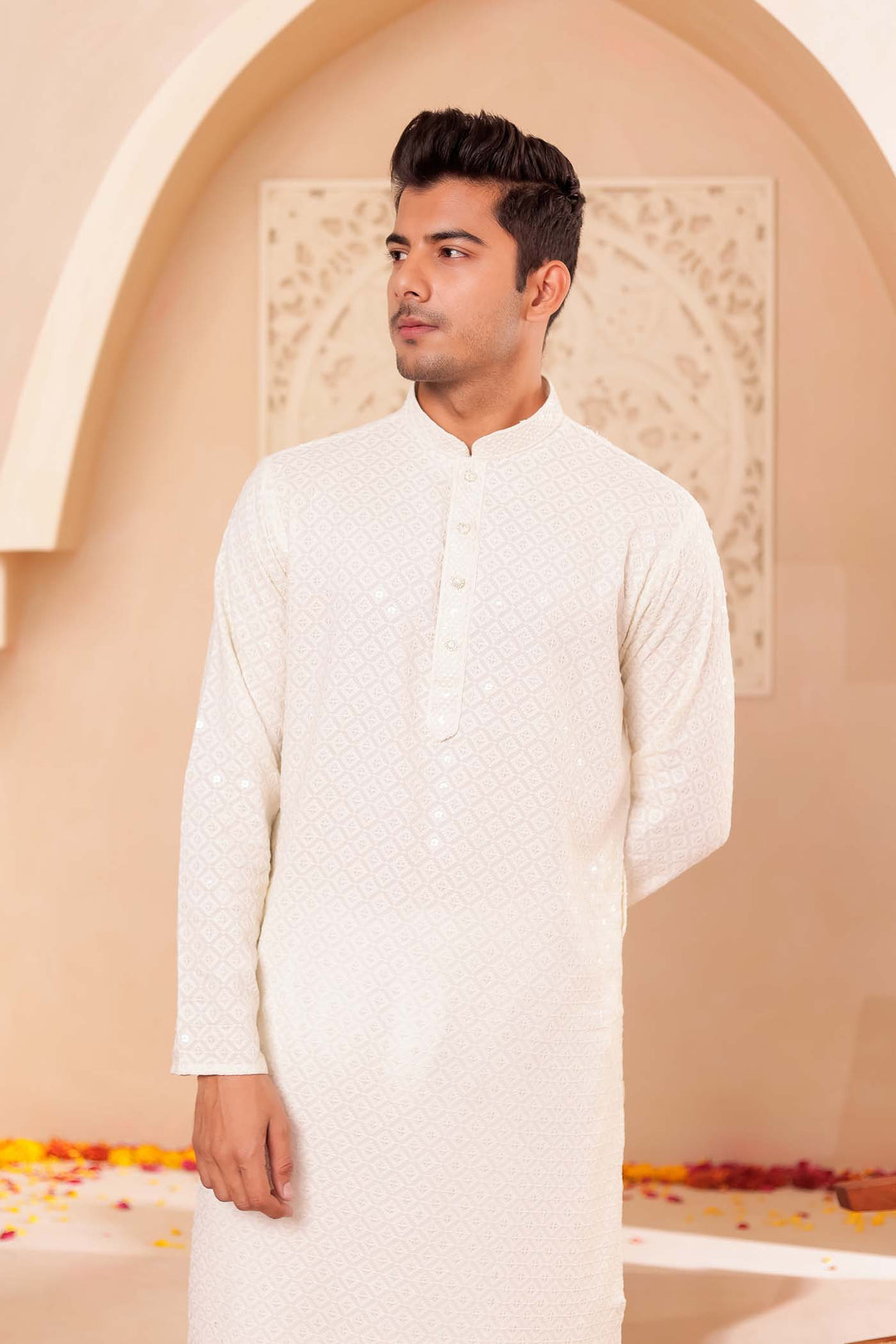 Ivory Chikankari Embroidered Kurta Suit.
