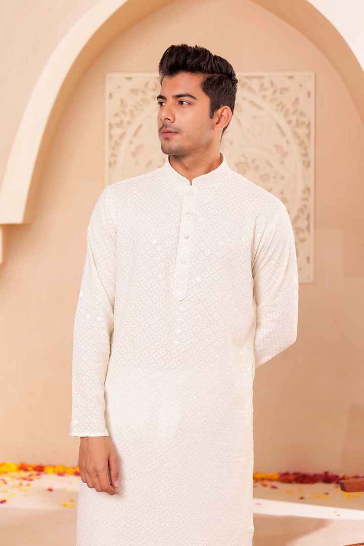 Ivory Chikankari Embroidered Kurta Suit.