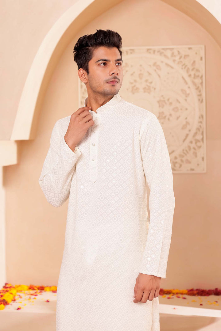 Ivory Chikankari Embroidered Kurta Suit.