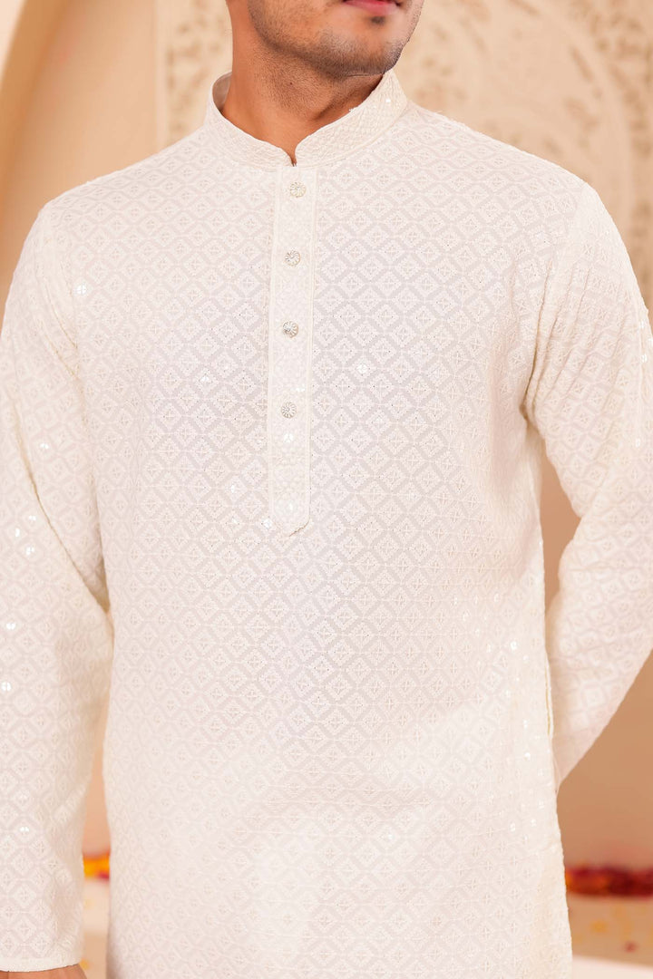 Ivory Chikankari Embroidered Kurta Suit.