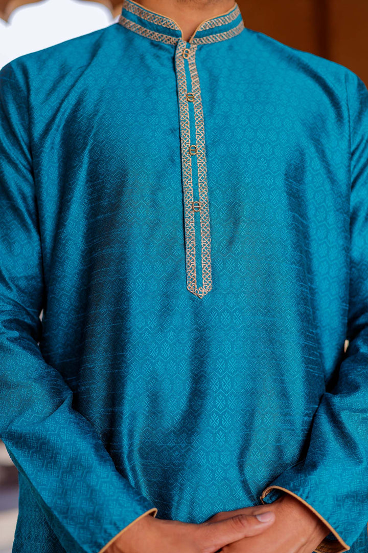 Teal Brocade Silk Kurta Suit With Gold Zari Work.