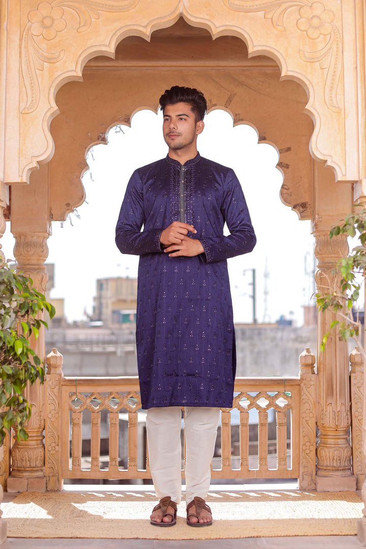 Navy Blue Raw Silk Kurta Suit With Resham Thread And Sequin Embroidery.