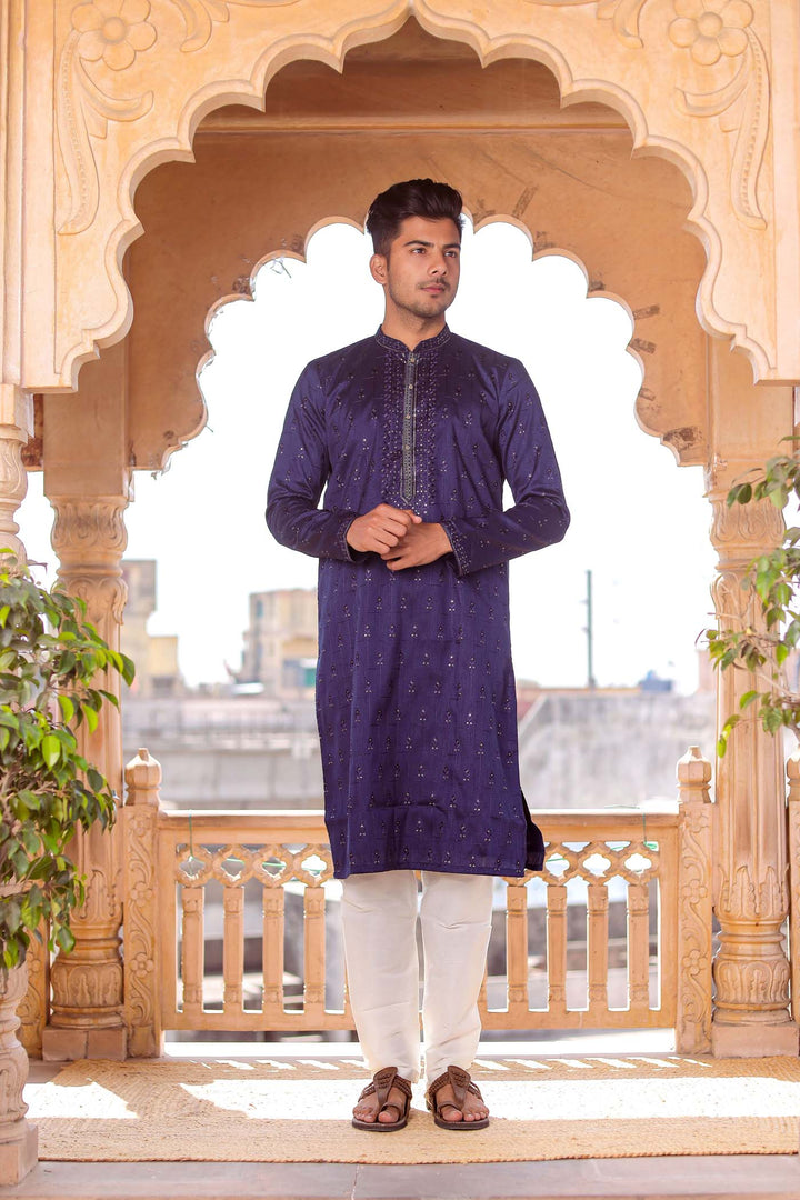 Navy Blue Raw Silk Kurta Suit With Resham Thread And Sequin Embroidery.