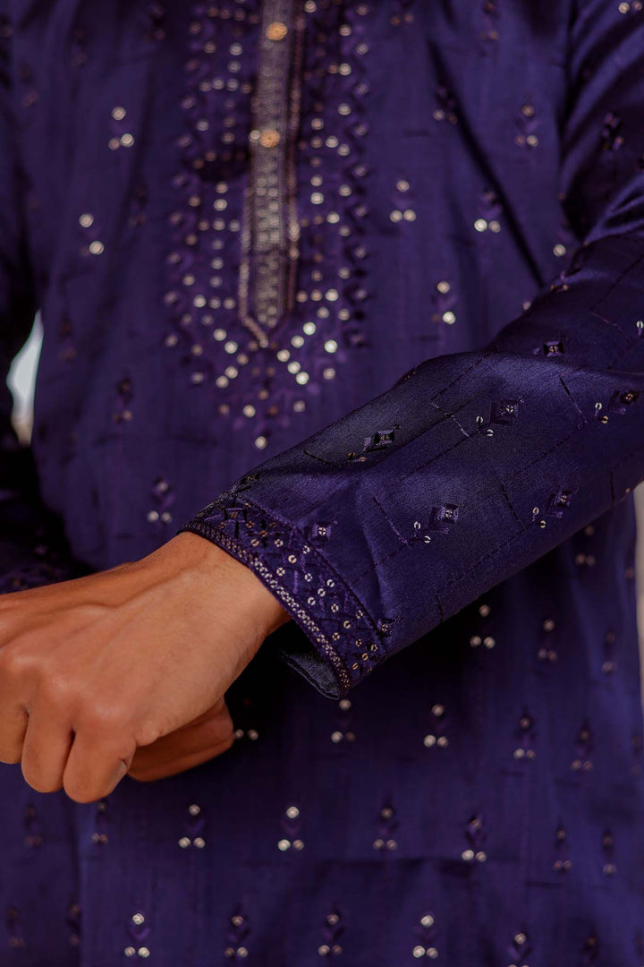 Navy Blue Raw Silk Kurta Suit With Resham Thread And Sequin Embroidery.