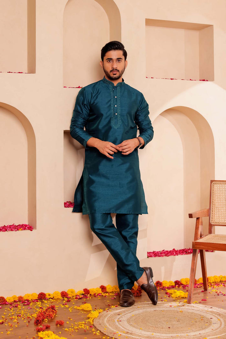 Teal Green Raw Silk Kurta Suit with Intricate work on neckline.