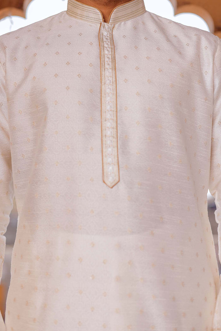 Off White Brocade Silk Kurta suit with resham thread embroidery.