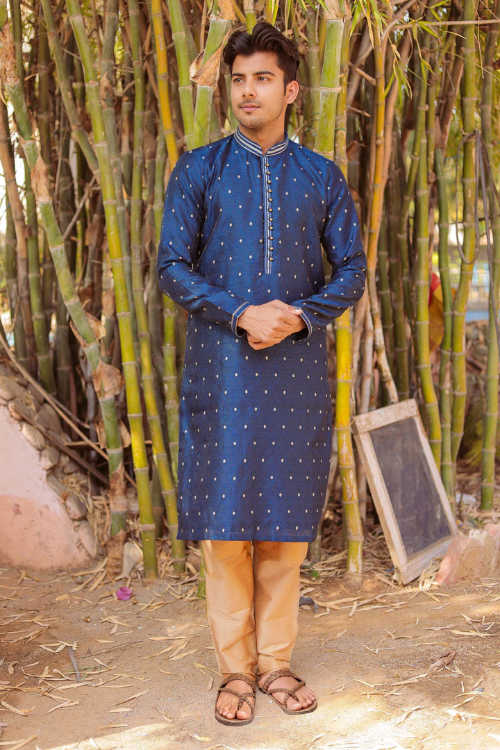 Midnight Blue Brocade Silk Kurta Suit adorned with golden butti.