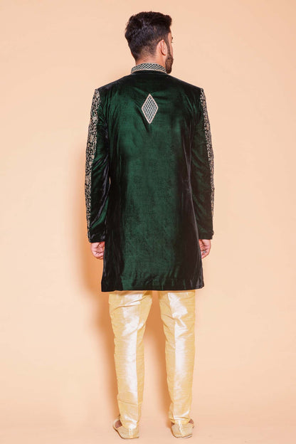 Designer Bottle Green Velvet Indo-western suit with gold resham thread work all over.