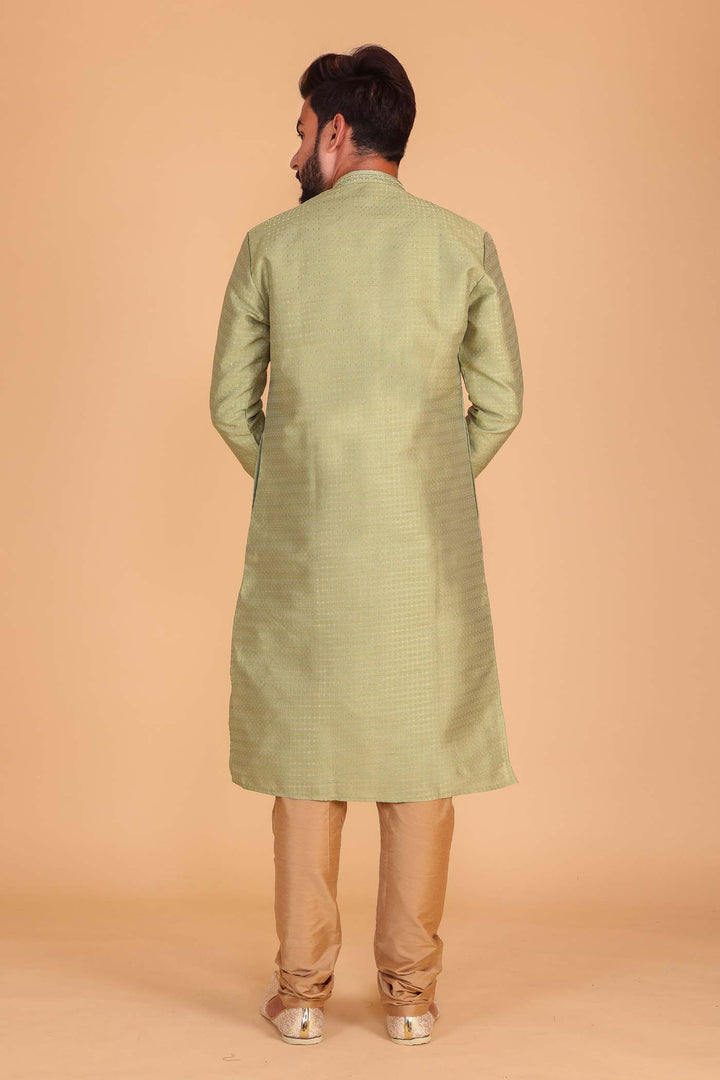 Mehndi Green Brocade Silk Kurta suit.