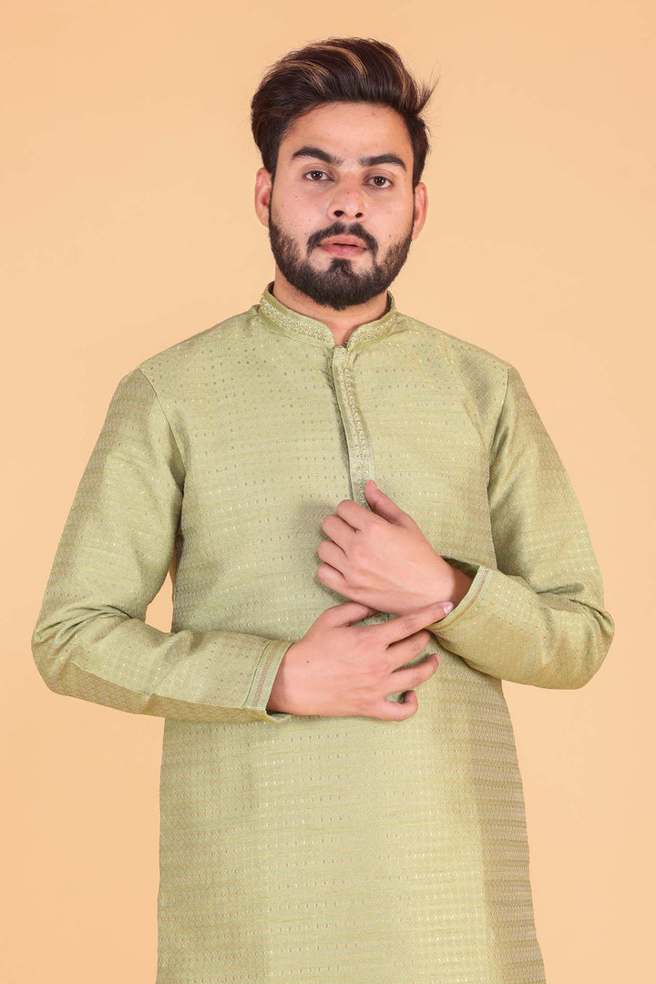 Mehndi Green Brocade Silk Kurta suit.