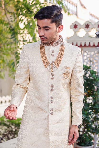 Cream Brocade Silk Indo-Western Sherwani Suit.